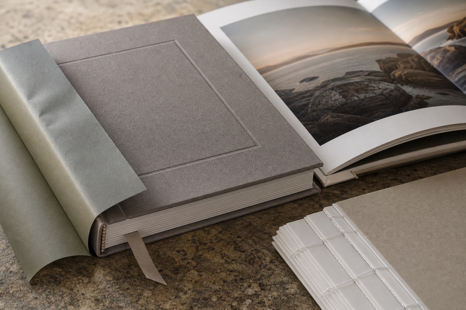 Close detail of cloth case, dust jacket, sewn signatures and ribbon marker