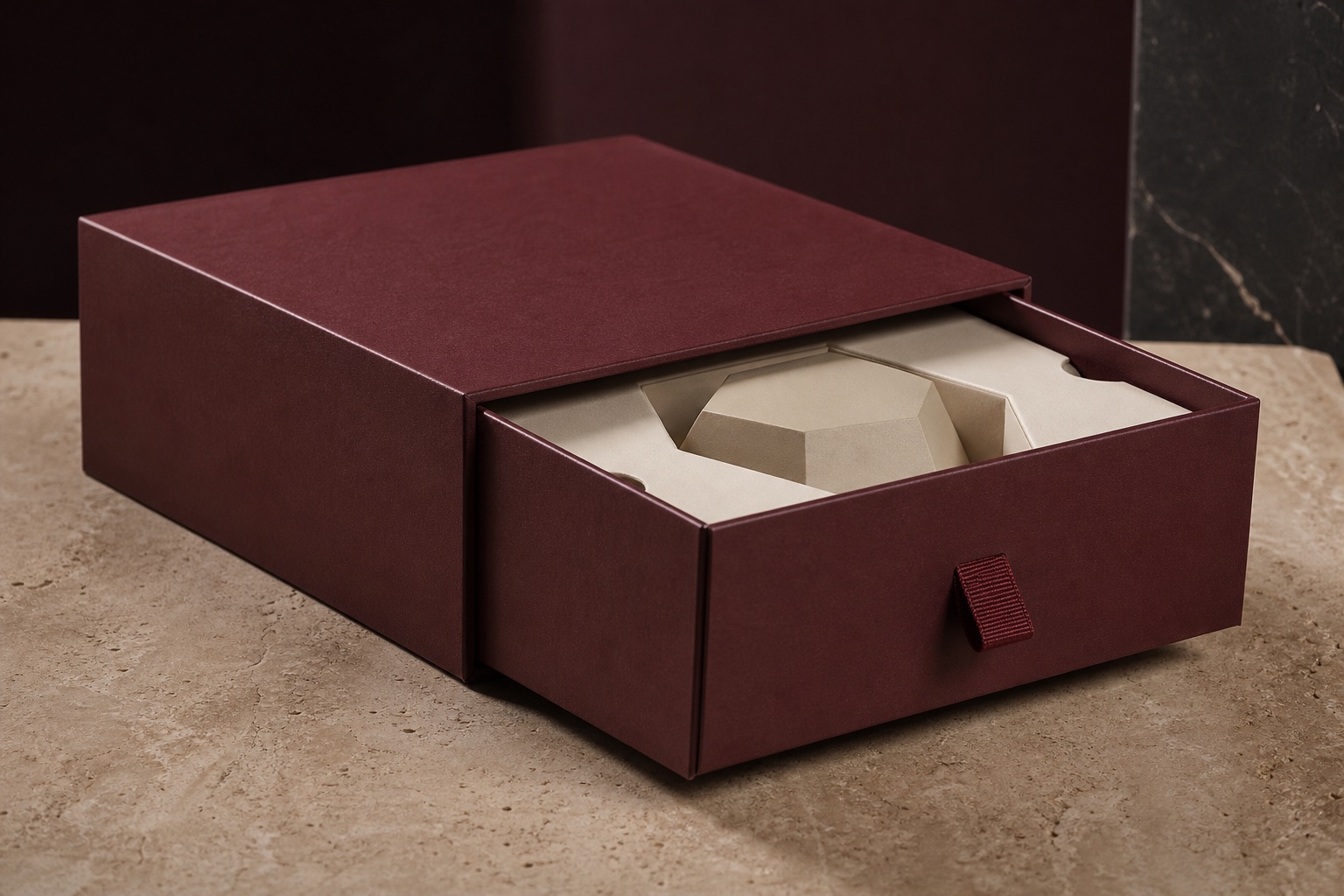 Burgundy rigid drawer box with ribbon pull and fitted insert