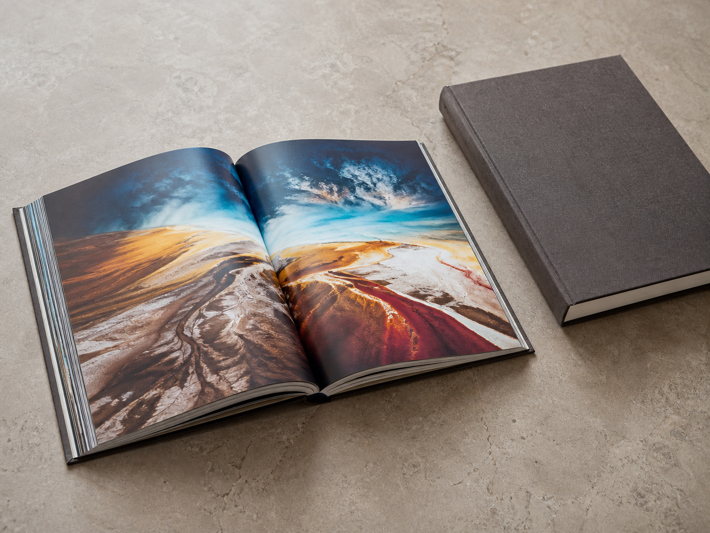 Large-format landscape photography art book with panoramic spreads