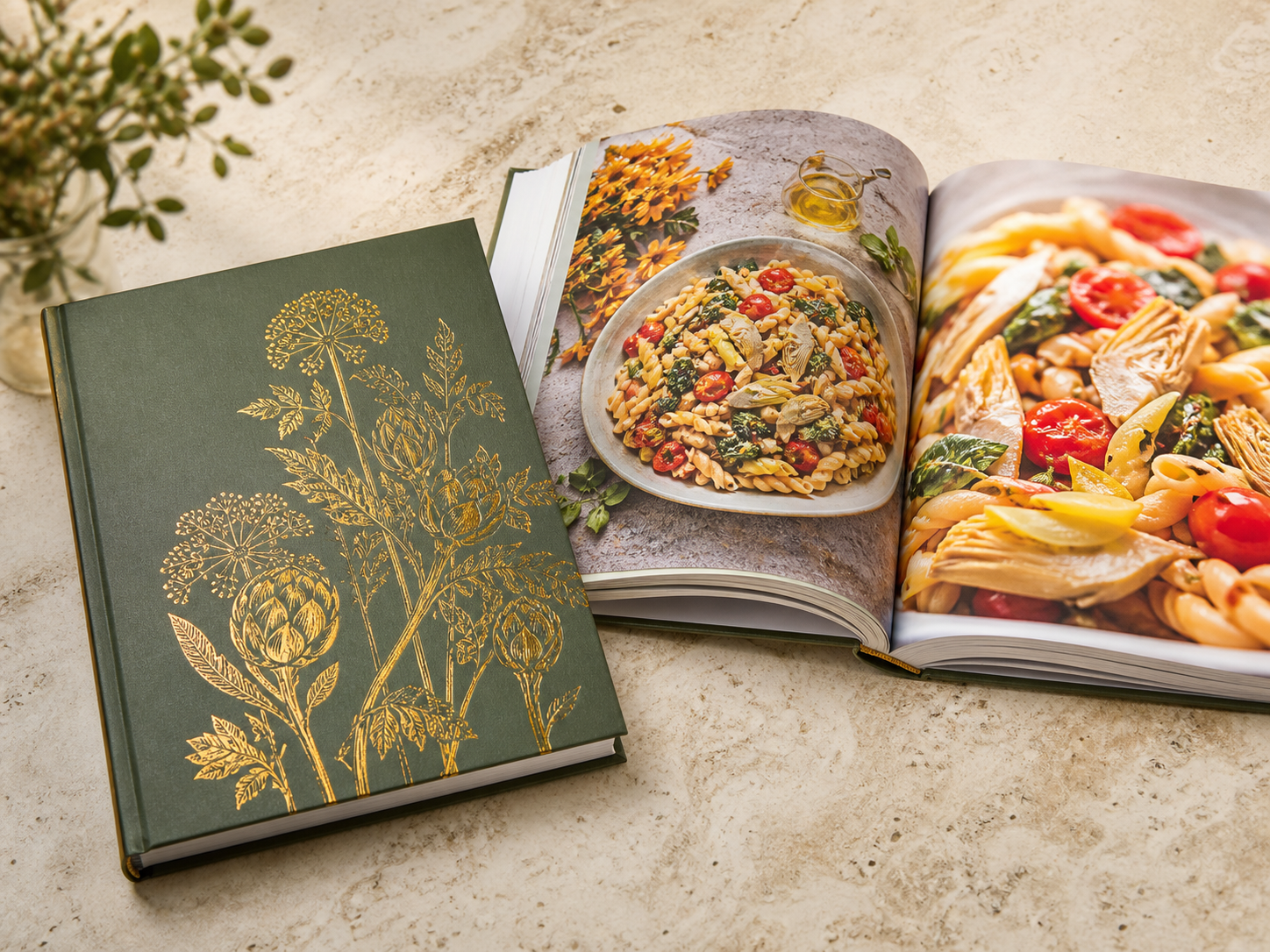 Mediterranean hardcover cookbook with colourful dish spreads