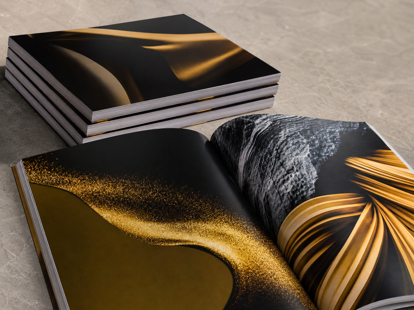 Black-and-gold visual-design art periodical with image-led layouts